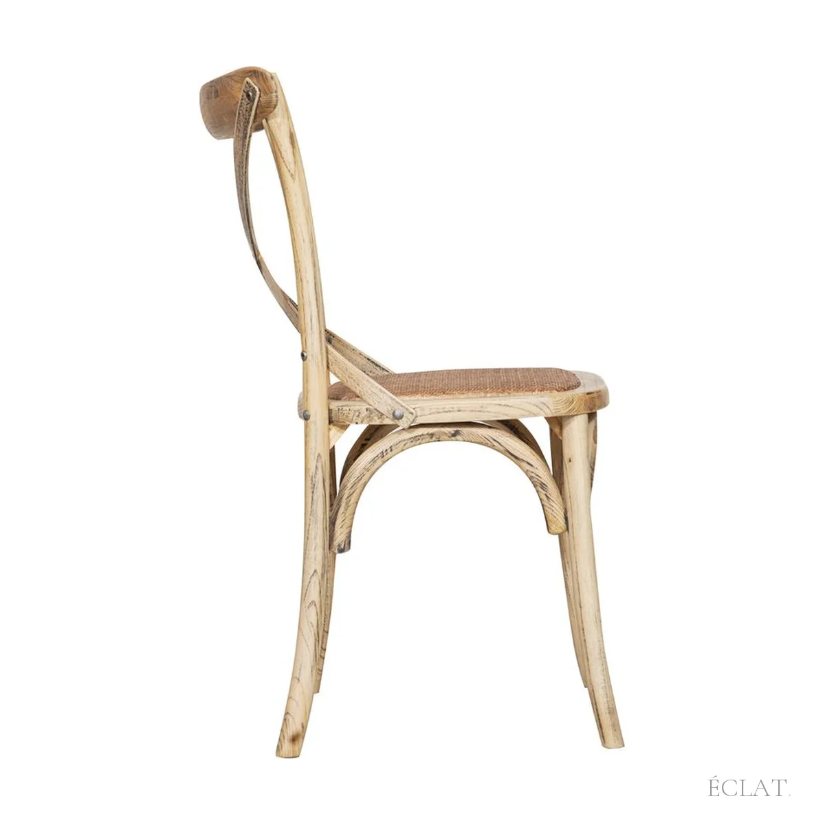 Chaise Thonet bois et rotin vue de profil, pieds cintrés reliés par un anneau, location pour mariage champêtre